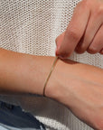 Model wearing 14k gold fill Delaney Bracelet