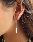 Model wearing 14k gold fill Lucy Drop earrings