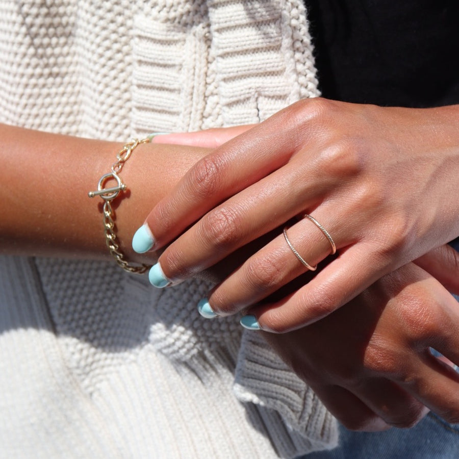 Model Wearing 14k gold fill Sunburst Infinity ring