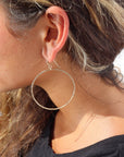 Model wearing 14k gold fill Soleil Hoops