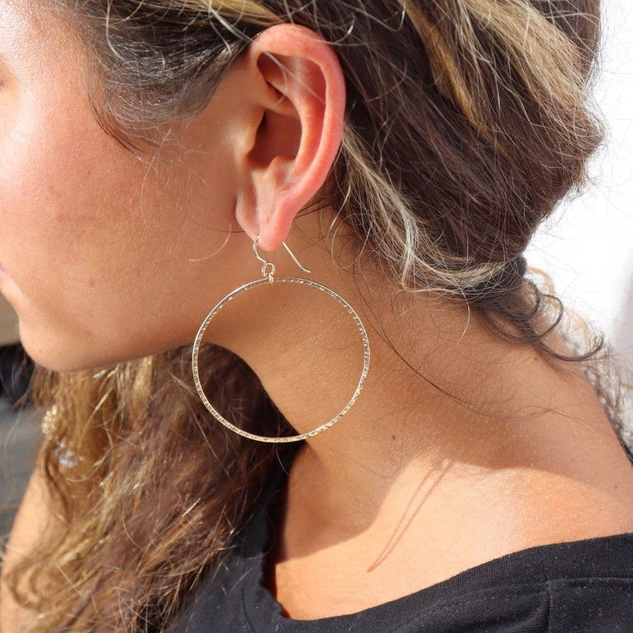 Model wearing 14k gold fill Soleil Hoops