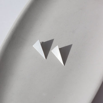 Sterling silver triangle shaped stud earrings ; smooth buffed finish ; handmade jewelry ; made in Eau Claire Wisconsin by token jewelry 