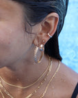 Model wearing 14k gold fill Simple Ear Cuff