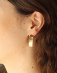 curved hammered gold earrings handmade by Token Jewelry in Eau Claire, Wisconsin