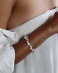 Model wearing 14k gold fill Pearl Petals Bracelet