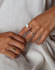 Model wearing 14k gold fill Mother of pearl ring