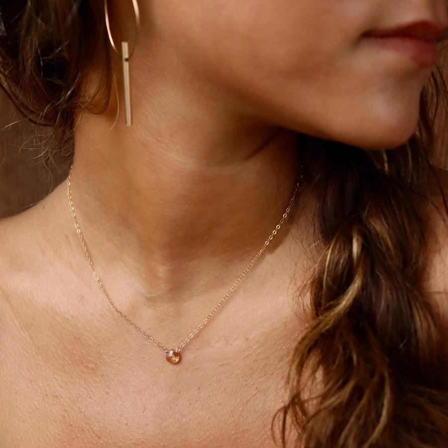 Model wearing 14k gold fill Peach Zircon Necklace