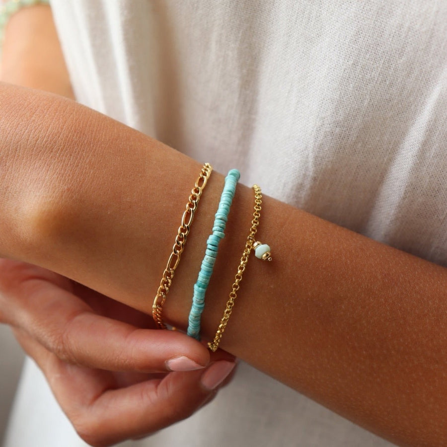 Model wearing 14k gold fill turquoise bracelet