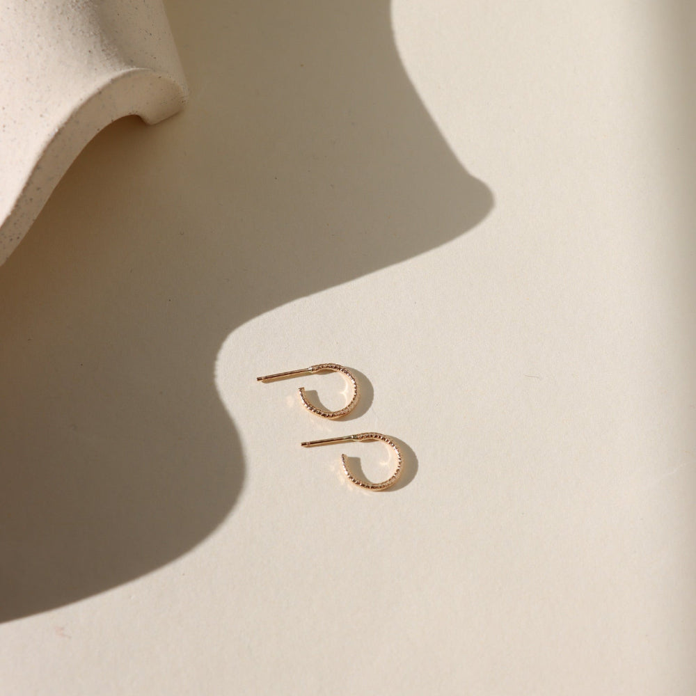 Mini Lumen Hoops — 14K gold fill or sterling silver hoops with a delicate sparkling wire, lightweight and perfect for stacking or wearing solo.