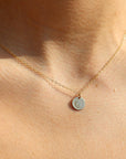 Luna Necklace in 14k gold fill on a model