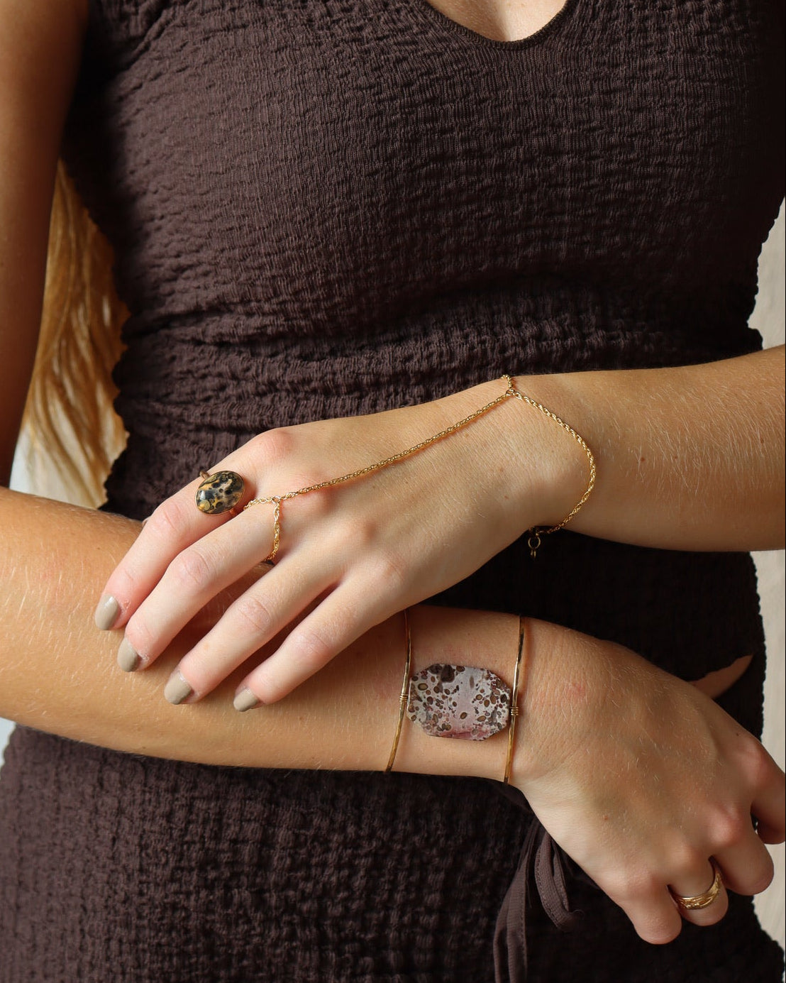 model wearing 14k gold fill hand chain featuring a jasper ring and cuff in 14k gold fill