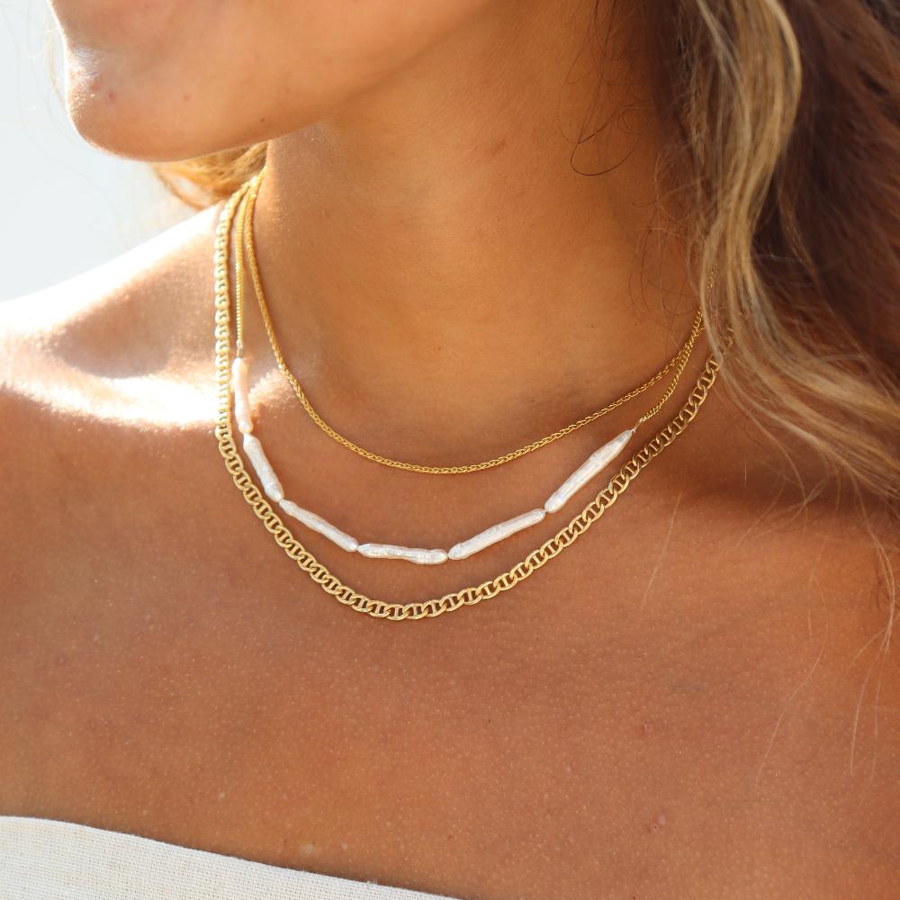 Model wearing 14k gold fill Maren Pearl necklace