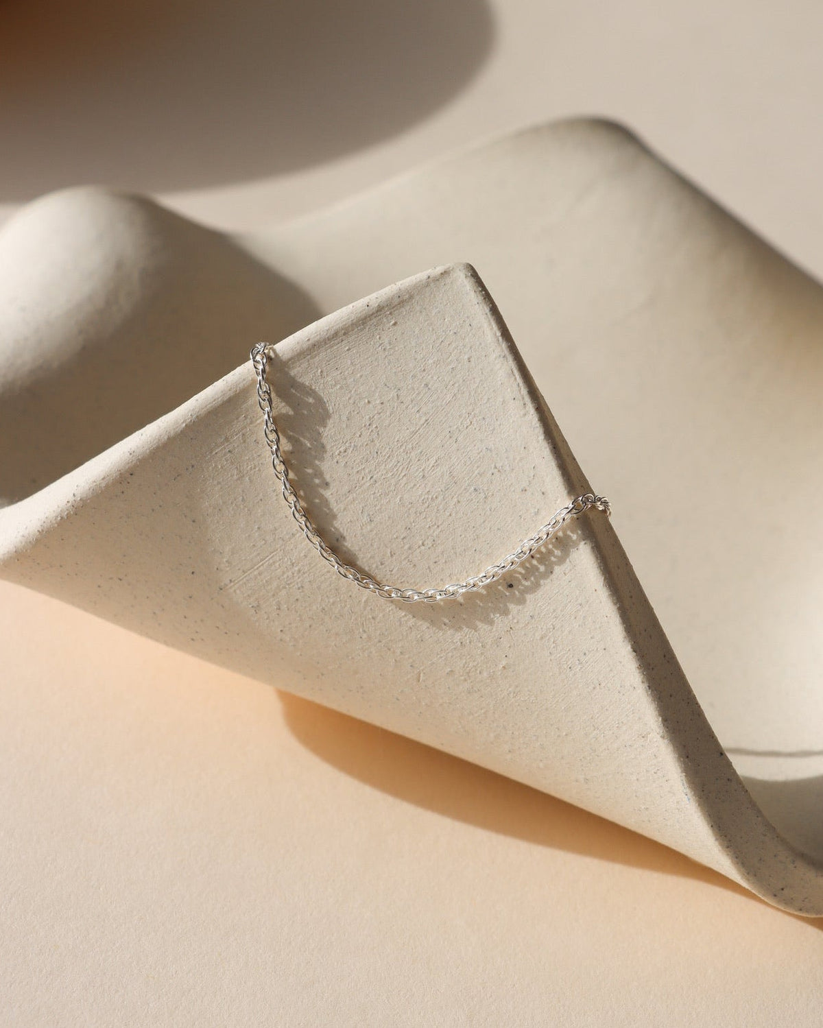 sterling silver chain in the sunlight