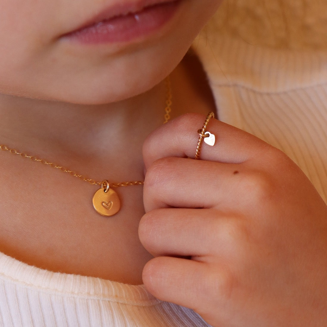 Model Found Wearing Heart Charmed Children's ring