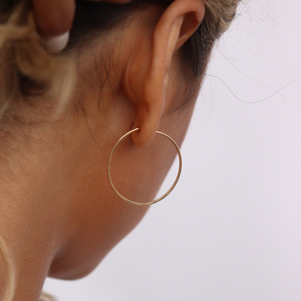 Model Wearing 14k gold fill Organic hoops