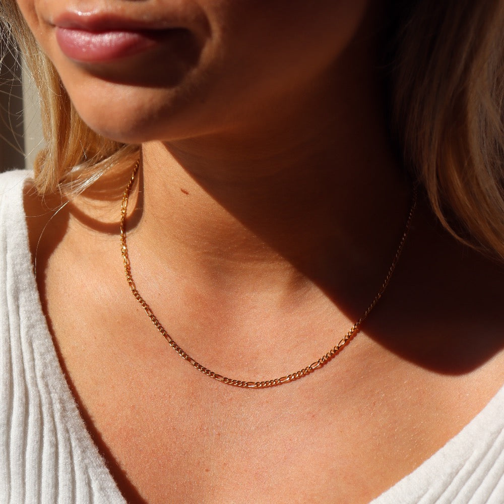 Model wearing 14k gold fill Capri Chain.