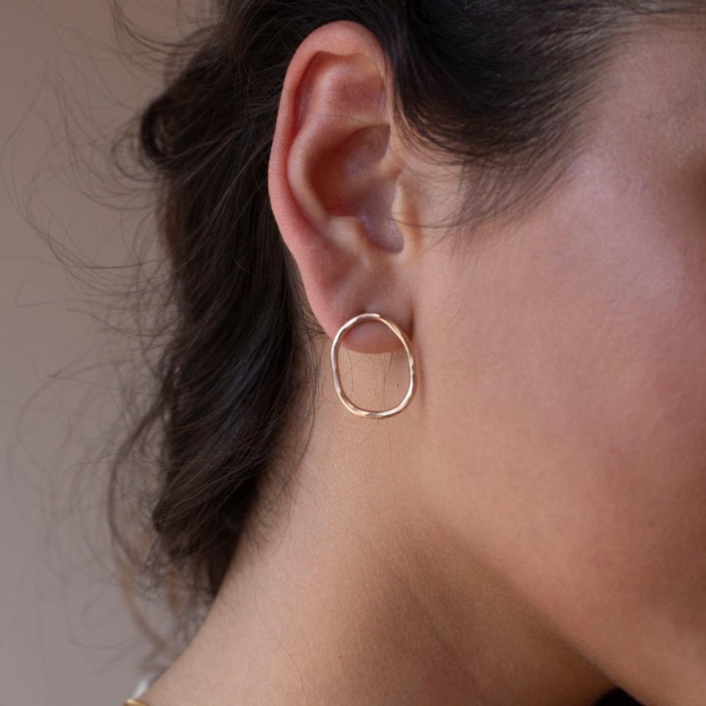 Model wearing Form Studs in 14k gold fill 