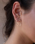 Model wearing Form Studs in 14k gold fill 