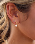 Model wearing 14k gold fill Pearla studs