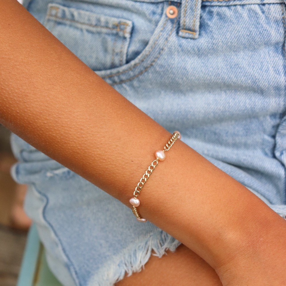 Model wearing 14k gold fill Rosalie Pearl Bracelet