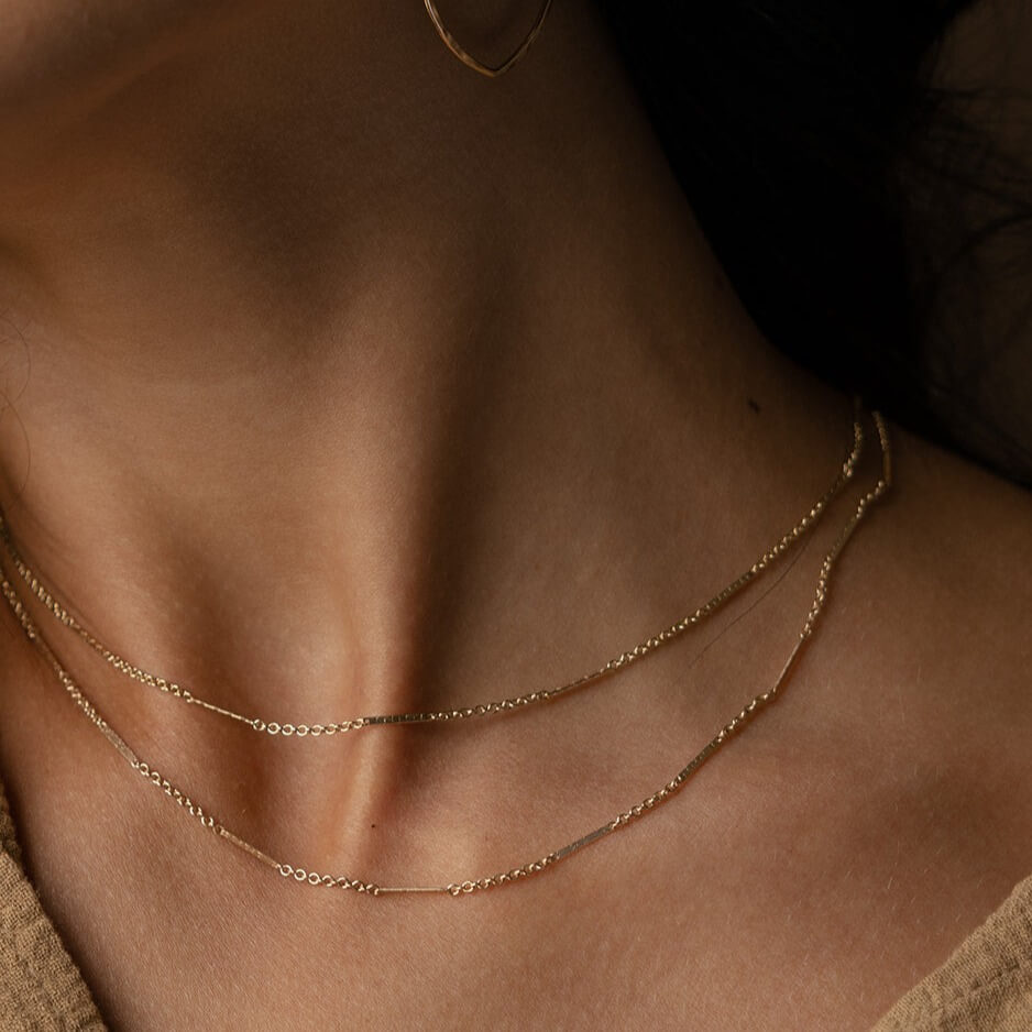 Model wearing 14k gold fill Sailor Chain - Token Jewelry