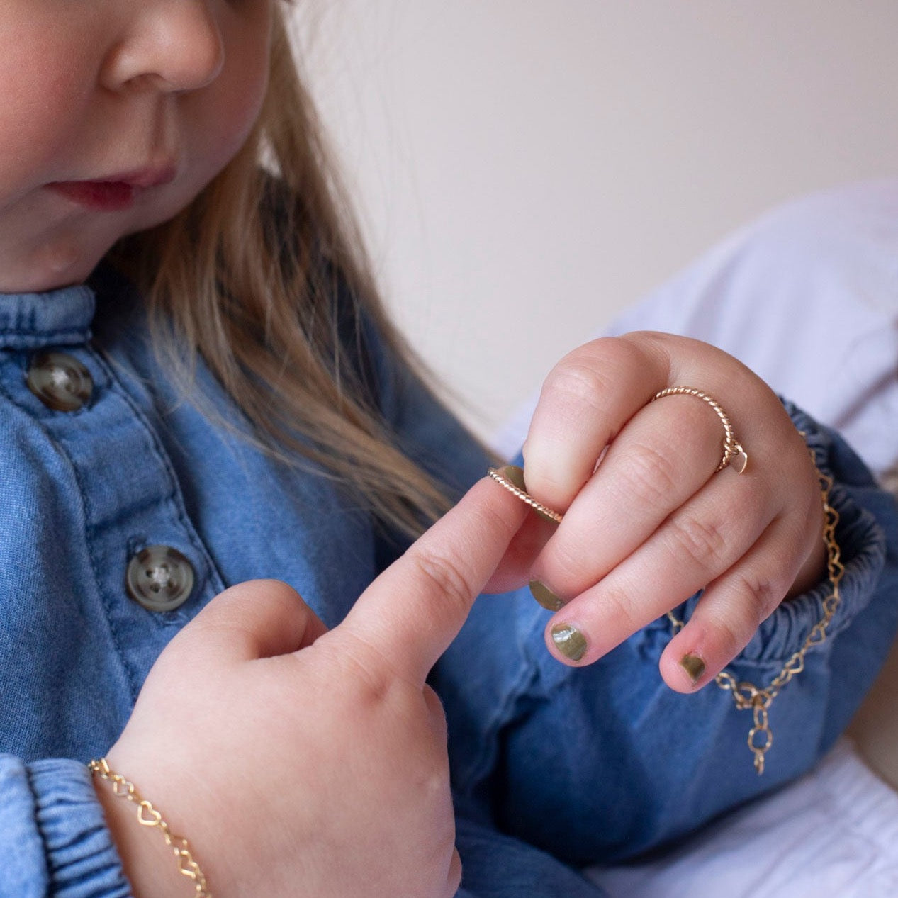 Model wearing Heart Charmed Children's ring