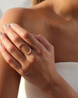 model wearing 14k gold fill oval hammered ring 