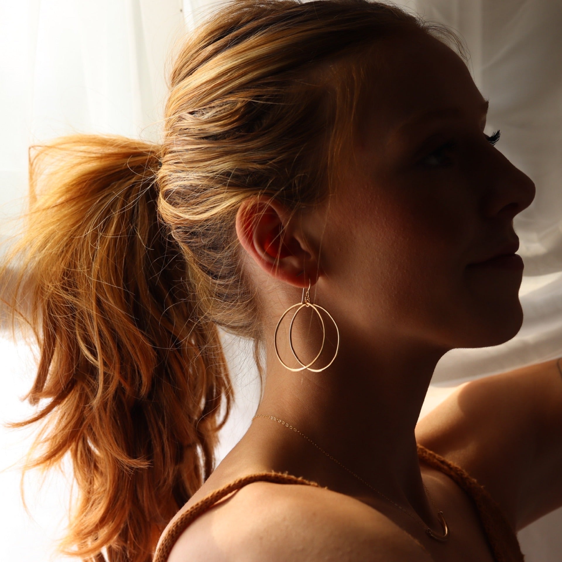 Model wearing Parallel Hoops - Token Jewelry