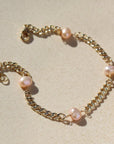 Rosalie Anklet in 14k gold fill on a tan plate