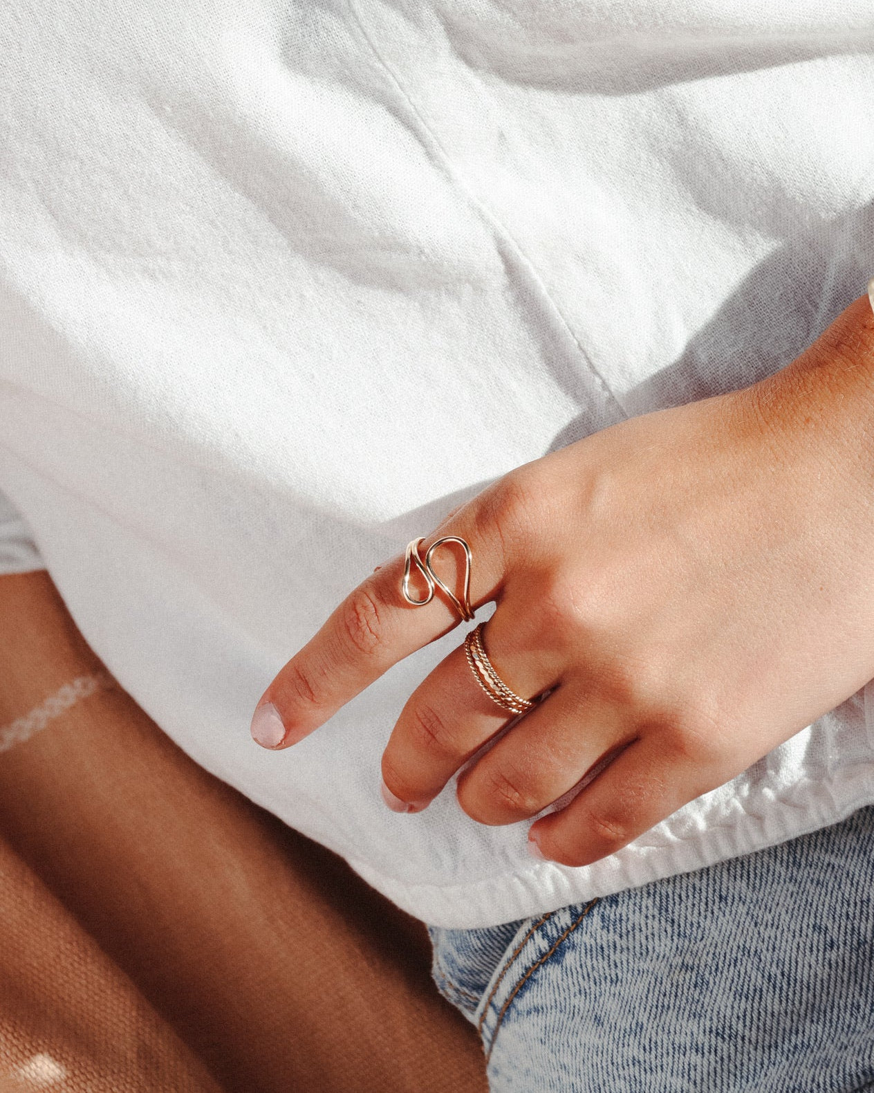 model wearing 14k gold fill sculptural ring 