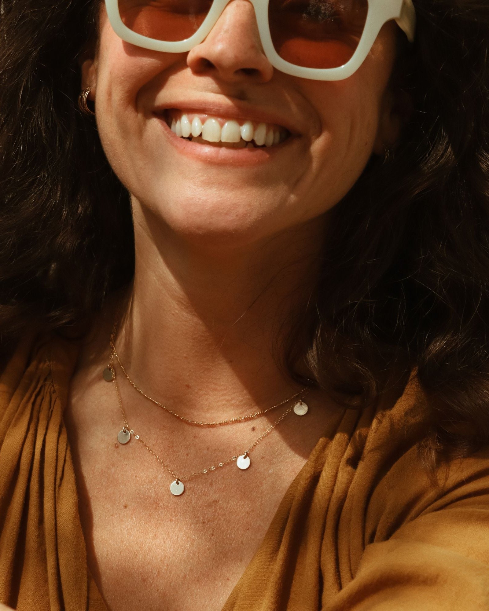 model wearing delicate figaro chain necklace with delicate chan necklace with round charms