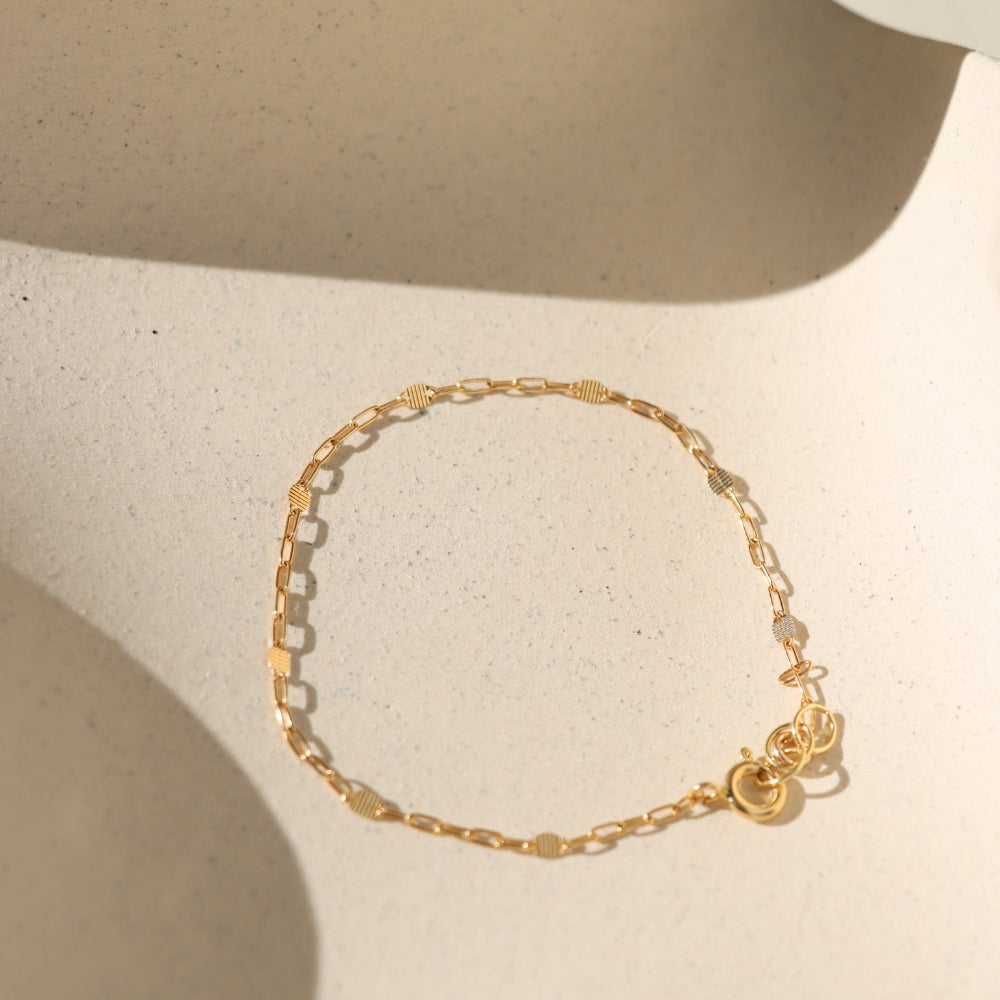 Sunspell Bracelet with softly textured links, available in 14k gold fill or sterling silver. Lightweight and comfortable, perfect for effortless layering and adding a subtle glow to any stack.