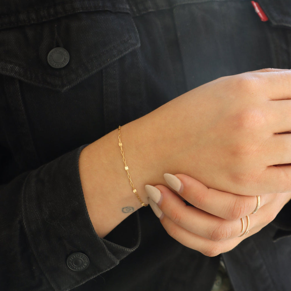 Sunspell Bracelet with softly textured links, available in 14k gold fill or sterling silver. Lightweight and comfortable, perfect for effortless layering and adding a subtle glow to any stack.