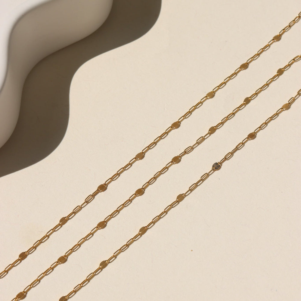 14k gold filled Sunspell Chain featuring delicate, light-reflecting links designed for layering or everyday wear.