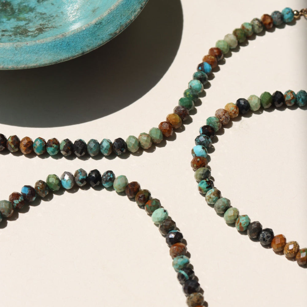 Taos Bracelet featuring multicolored turquoise beads in soft blues, greens, and browns with a gold filled spring clasp.