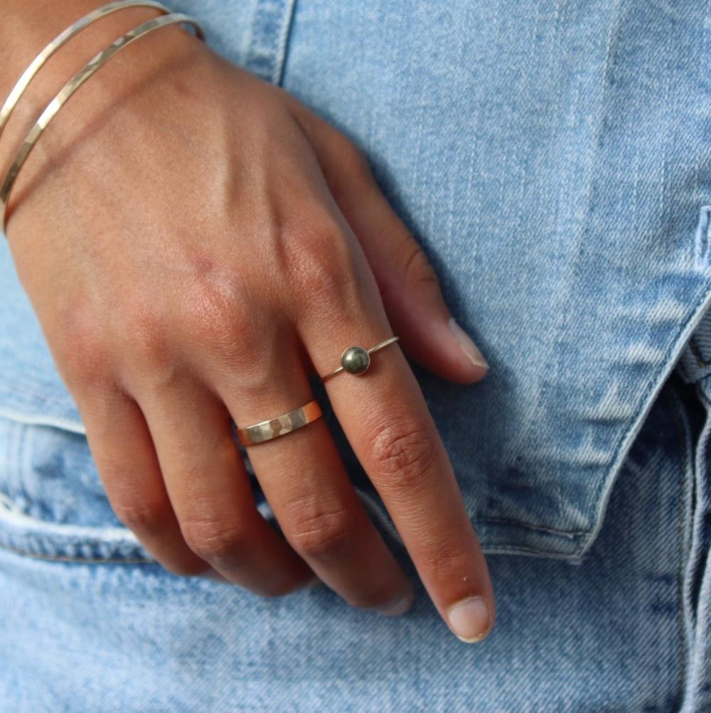 Token Jewelry Pyrite Ring in 14 gold fill on a model