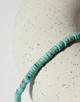 Turquoise Beaded Bracelet on a white plate