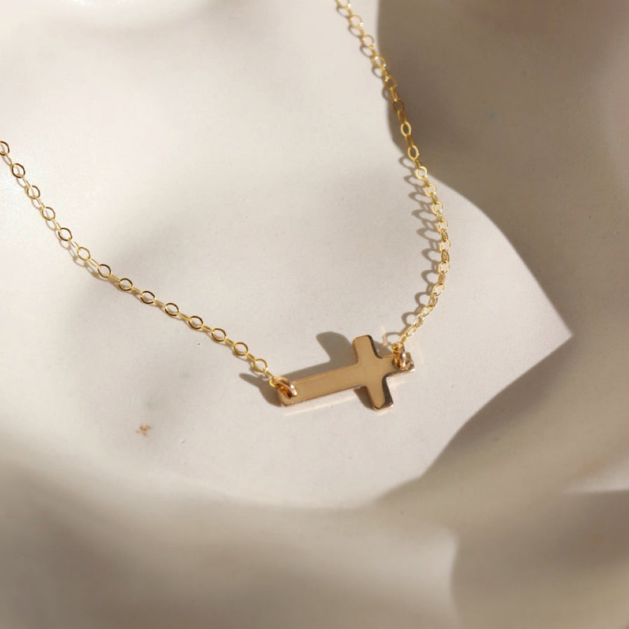 gold delicate cross chain necklace handmade in Eau Claire, Wisconsin by Token Jewelry