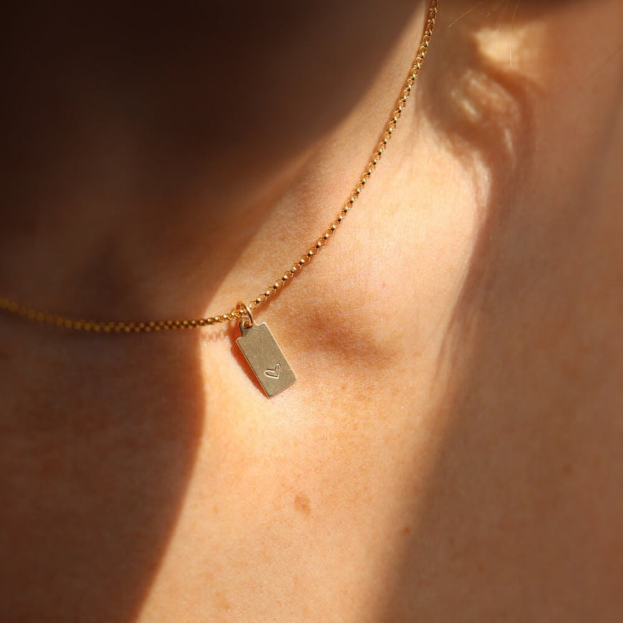 Mini Tag necklace with heart - token jewelry designs - minimal everyday jewelry - handmade jewelry - local jewelry store - jewelry store near me