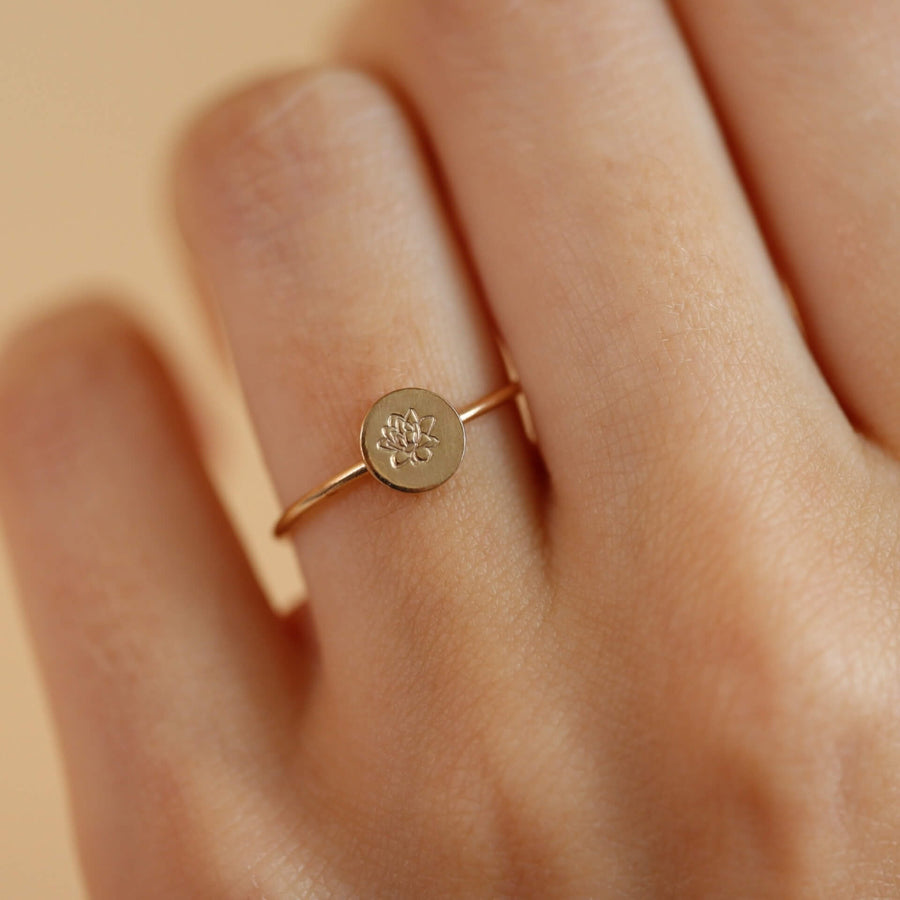 Birth flower ring featuring a Lotus flower for the month of August. Mother's Day Gifts, Personalized Jewelry, Handmade Jewelry, Gold Ring that's flower stamped by Token Jewelry in Eau Claire, WI